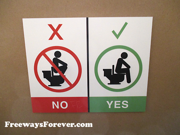 Sign showing proper bathroom use