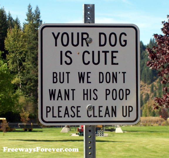 Dog is cute, clean up poop sign