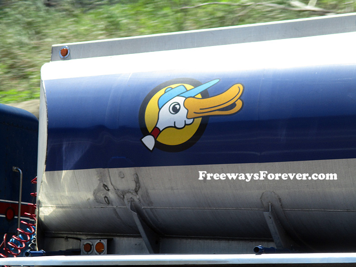 Close-up detail view of Aqua Duck logo on tanker truck