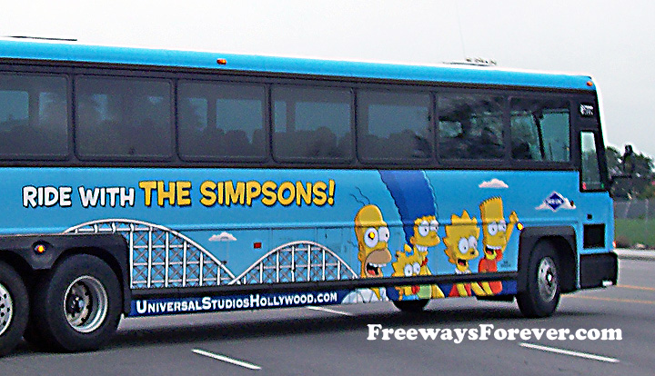 Tour bus with Simpsons family and roller coaster painted on it