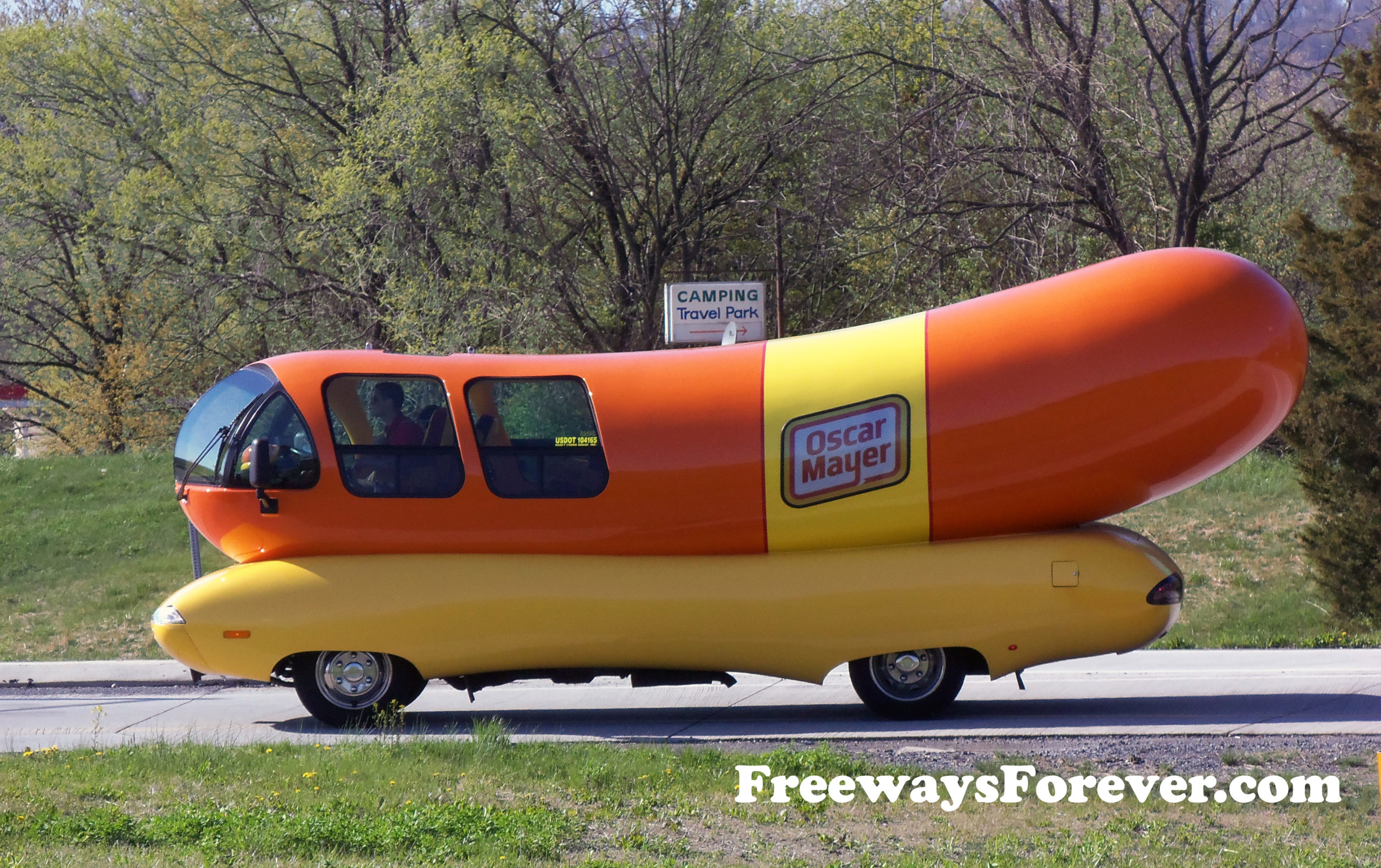 Funny picture of Oscar Mayer Wienermobile on an exit ramp